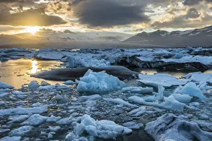Jokulsarlon Glacial Lagoon Prints: Icebergs, pieces of ice, dramatic clouds