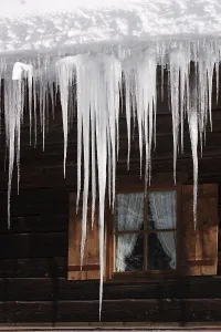 Europe Winter Landscape Photography Prints: Icicles in front of a window