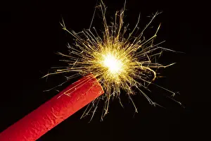 Deserted Fireworks Display Prints: Ignited firework, firecracker, firecracker with burning fuse