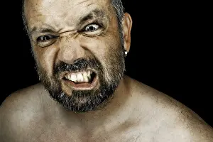 Self Confident Male Prints: An image of an angry man with a beard