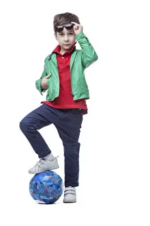 Studio Shot Sportsman Prints: Image of athletic cute boy posing with ball in studio