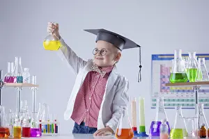 Science Laboratory Equipment Prints: Image of little chemist posing with variety of reactants