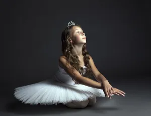 Female Dancer In Studio Prints: Image of pensive young ballet dancer posing in studio
