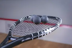 Tennis Equipment Prints: Image of racket and three squash balls