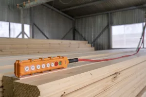 Timber Industry Equipment Prints: Image of remote control for crane loading timber
