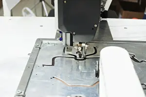 Handicraft Industry Equipment Prints: Image of sewing machine stitching on patterns