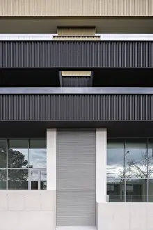 Minimalist Modern Architecture Prints: This image showcases a modern architectural structure with eco-friendly design elements
