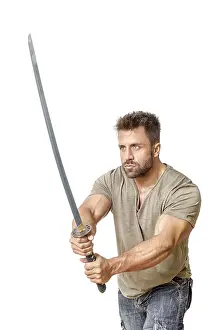 Muscular Male Athlete Prints: An image of a strong man with a sword
