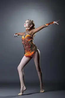 Flexible Female Dancer Prints: Image of young artistic gymnast performs in studio