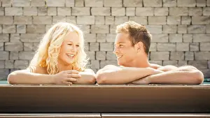 Sensual Couple Images Prints: An image of a young couple at the pool