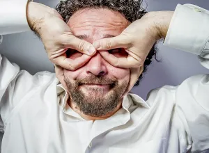 White Background Headshot Prints: Imagination and madness, man with intense expression