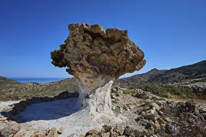 Southeast Europe Mountainous Region Prints: Impressive rock formation rises in front of an extensive mountain range