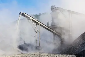 Open Pit Mining Prints: Industrial background, crusher rock stone crushing machine at open pit mining and processing plant for crushed stone