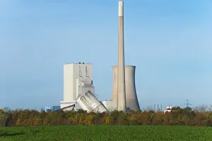 Power Generation Emissions Prints: Industrial building in an advanced stage of implosion