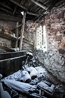 Deserted Winter Scenes Prints: Inside an old and squalid building in winter