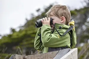 Recreational Activities For Kids Prints: Interested boy looking through binoculars