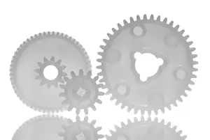 Medical Teamwork Prints: Three interlinked gear wheels