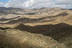 Hilly Landscape Prints: Interplay of light and shadow on a hilly landscape