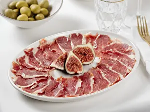 Restaurant Table Setting Prints: Jamon on plate with figs on restaurant table