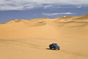 Libyan Desert Travel Photography Prints: Jeep in the Libyan Desert, Libya