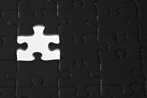 Missing Puzzle Piece Prints: Jigsaw puzzle in backlight, one piece missing