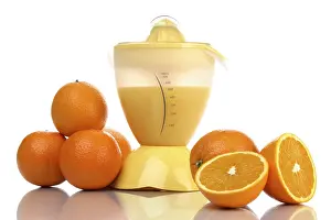 Healthy Eating Essentials Prints: Juicer with oranges