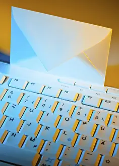 Computer Keyboard Prints: The keyboard of a computer and an envelope