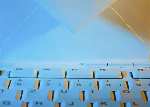 Computer Keyboard Prints: The keyboard of a computer and an envelope