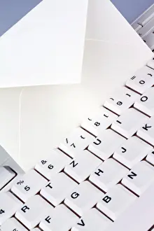 Computer Keyboard Prints: The keyboard of a computer and an envelope