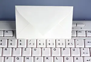 Computer Keyboard Prints: The keyboard of a computer and an envelope