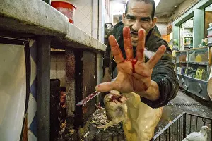 Marrakech Souk Prints: Killing of chickens, souk of Marrakech
