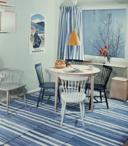 Retro Kitchen Decor Prints: Kitchen in the past. A kitchen with a round kitchen table with four kitchen chairs