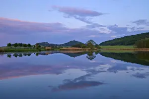 Deserted Castle Evening Sun Prints: Lake with reflection in spring with castle at sunset