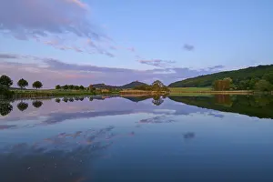 European Defence Work Prints: Lake with reflection in spring with castle at sunset