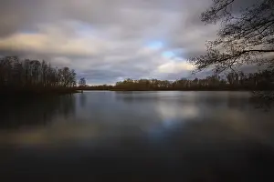 Long Exposure Water Photography Prints: Lake with trees and a cloudy sky