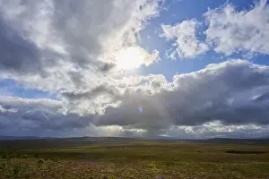 Dramatic Scottish Landscape Prints: Landscape under dramatic sky with sunbeams and cloud formations