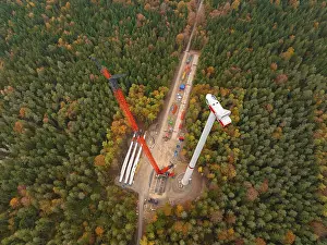 Ecofriendly Electricity Generation Prints: Large construction site of a wind power project in a dense