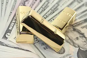 Capital Market Investments Prints: Three large gold bars on many dollar notes