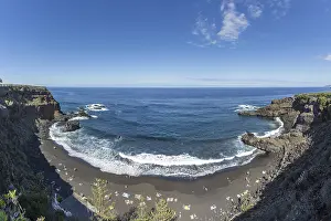 Volcanic Sand Beach Prints: The lava beach lined with bathers