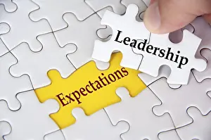Team Collaboration Strategy Prints: Leadership Expectations, Jigsaw puzzle with missing piece showing the text Leadership Expectations highlighted in focus