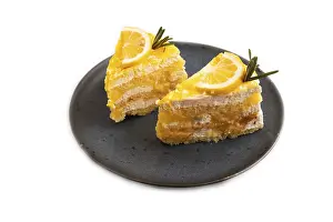 Bright Background Prints: Lemon cake isolated on white background