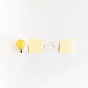 Bright White Background Photo Prints: Light bulb brain with two adhesive notes white background