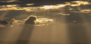 Peaceful Morning Atmosphere Prints: Light rays of the sun's rays through clouds in the morning