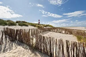 Lighthouse Sylt Prints: Lighthouse with blue sky at Ellenbogen