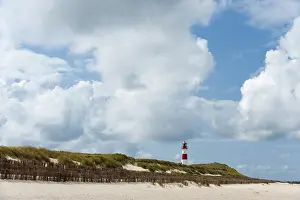 Deserted Island Scene Prints: Lighthouse with blue sky at Ellenbogen