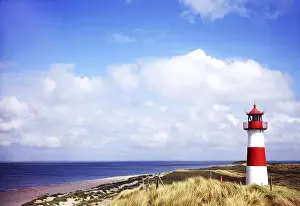 North Sea Dunes Prints: Lighthouse and dunes at the elbow