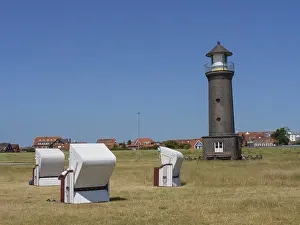 Deserted Lighthouse Scene Prints: A lighthouse in the middle of a meadow