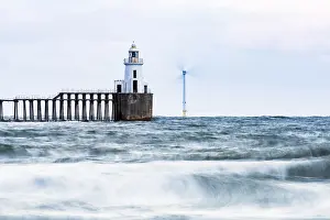 Wind Power Generation UK Prints: Lighthouse and windmill in the sea