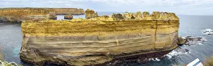 Limestone Cliffs Prints: Limestone cliffs rise dramatically above the ocean