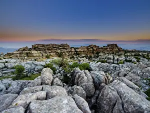 Atmospheric Evening Sky Prints: Limestone rock formations at dusk